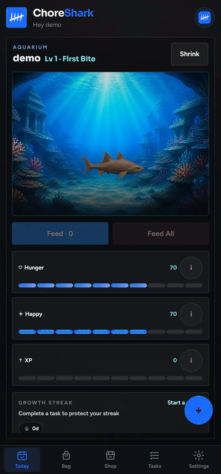 The expanded aquarium screen showing Hunger at 70, Happy at 70, an XP bar and a growth streak.